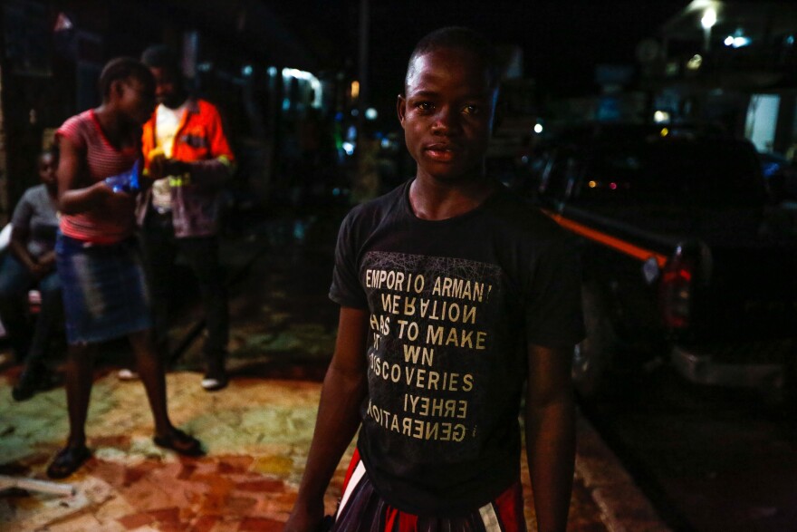 Cherridon S. Delee runs Justina's video club. He says that Liberians like to root for the Barcelona, Chelsea and Real Madrid soccer teams.