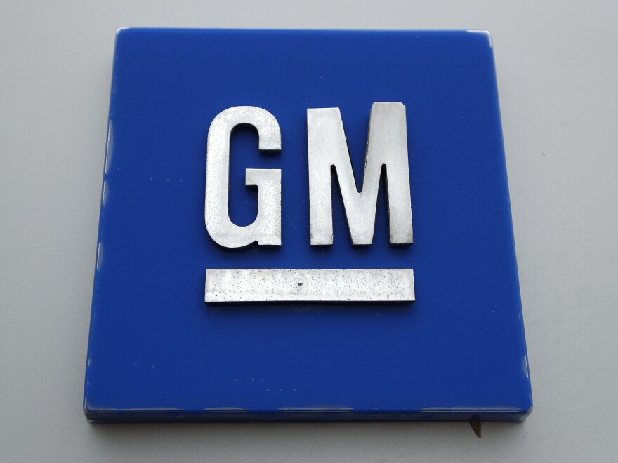 The General Motors logo is displayed outside the General Motors Detroit-Hamtramck Assembly plant, Jan. 27, 2020, in Hamtramck, Mich.