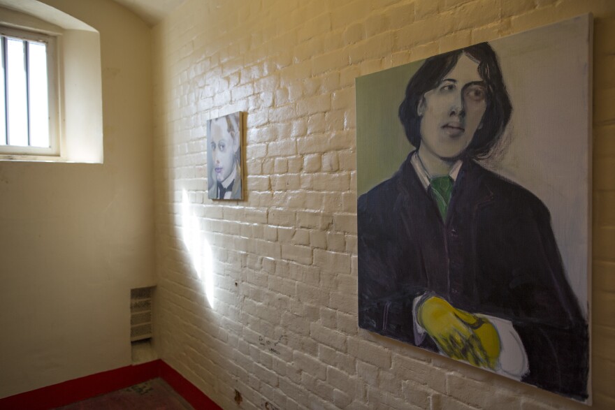 A painting of Wilde hangs inside a cell at the former Reading Prison. In 1895, Wilde was convicted of homosexual activity and sentenced to serve two years.