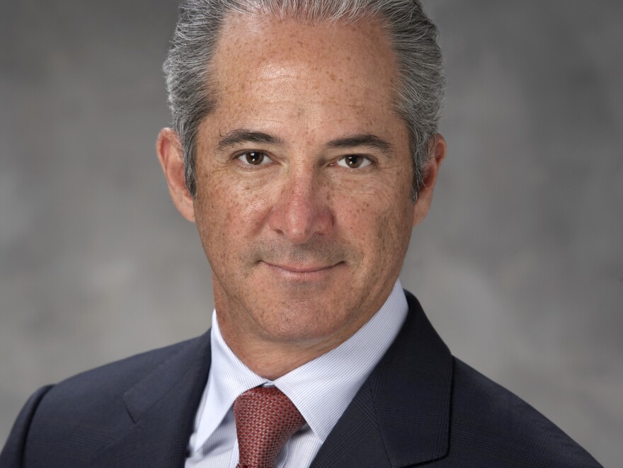 Jeffrey Fisher of Florida says any tax increase ought to be accompanied by cuts to government programs.