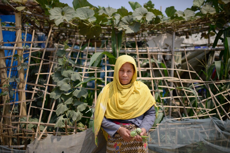 Fatima Katu, 40, has started a small garden at her home in the refugee camp. Compared to her previous shelter in the camp, she says, "We have more space here and now it feels like home."