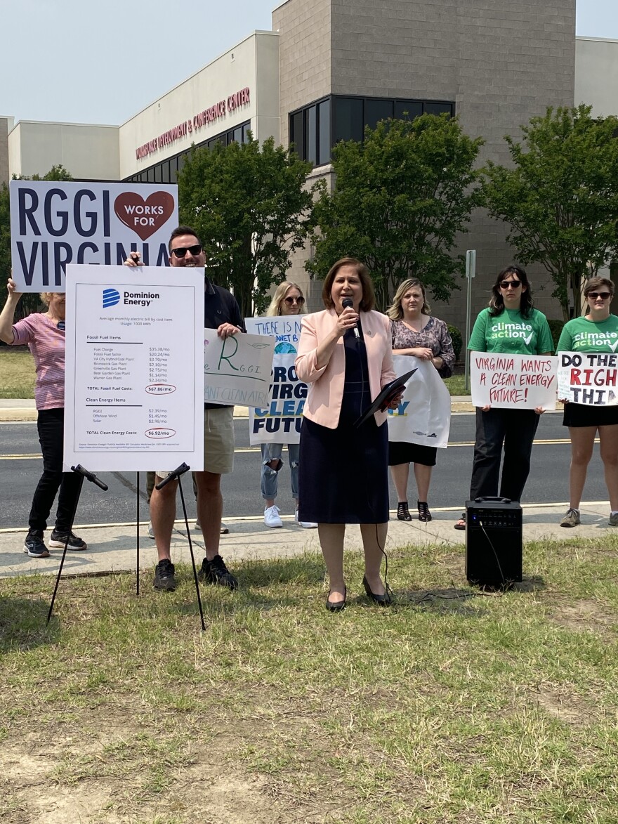  Protesters gather outside a meeting of the Virginia Air Pollution 