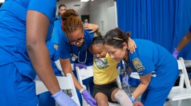 Pictured: Emergency responders participate in a full-scale pediatric disaster simulated exercise organized by the Virgin Islands Department of Health's EMS for Children Program.