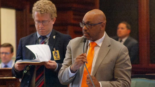 Democratic Rep. Thaddeus Jones speaks on the House floor on his way to passing a pair of bills to regulate the homeowner and auto insurance industries.