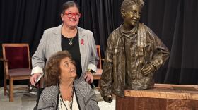 A sculpture of Ryan White was unveiled at the Indiana Memorial Union. Next to the sculpture are White's mom, Jeanne White-Ginder, and his sister Andrea White.