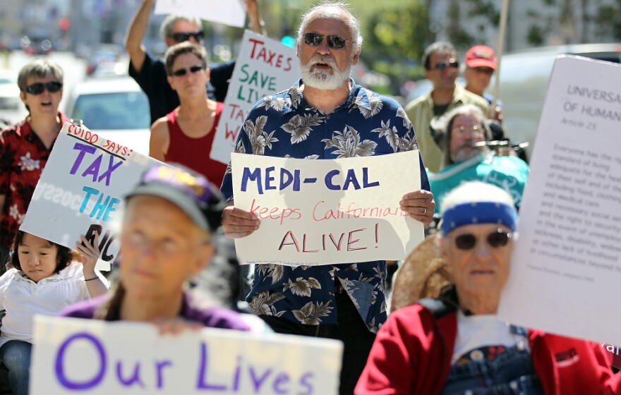 In San Francisco in September, dozens of people with disabilities gathered to protest proposed cuts to Medicaid and Medicare programs. The Supreme Court will hear the case on Monday.
