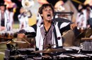 Aiden De Hon, a marimba player from Dallas, performs “The Final Sunset” with The Troopers — a Casper, Wyoming-based drum corps — during a show on Tuesday, July 22, 2025, at Belleville West High School in Belleville.