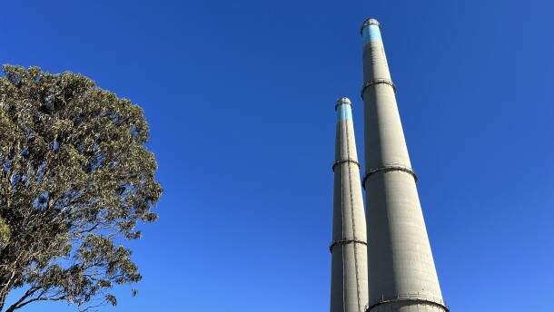 Two towers at a battery plant.