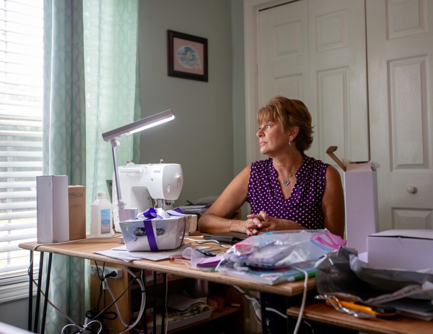 Suzanne Rybak sits inside the craft room at her home in Florence, S.C. In June 2020, in his childhood room across the hall, her son Jameson died of an overdose.