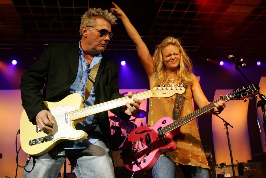 Miranda Lambert (right) performing with her longtime guitarist Scotty Wray in 2006.