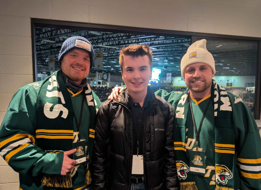 WNMU's Liam Ulland-Joy in between Josh and Jase at the Berry Events Center on NMU's campus
