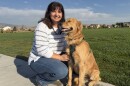 Christine Hull and Milo Bear pose for the camera, sharing a smile on a warm August morning.