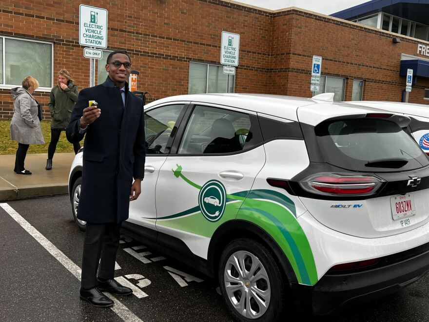 Cleveland Mayor Justin Bibb holds the keys to one of the city's two new electric vehicles after taking a test drive on Wednesday, November 30, 2022. The vehicles were parked at a new electric vehicle charging station located outside of Frederick Douglass Neighborhood Resource and Recreation Center in the Lee-Miles neighborhood. The city constructed the charging station in an effort to improve equity and access to electric vehicles in historically underserved communities.