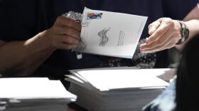 An election worker continues the process in counting ballots for the Pennsylvania primary election, Wednesday, May 18, 2022, at the Mercer County Elections Board in Mercer, Pa.