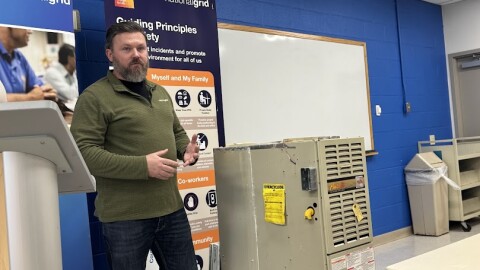 At National Grid, service supervisor Matt Shorney demonstrates the importance of keeping your furnace well maintained.