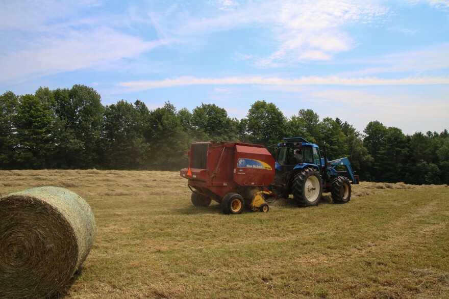 Farmer Tom Johnston baling hay on a field in Montville that's in the Ag Allies program.