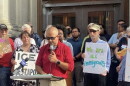 Luis Torres, president of Metro Justice, speaks Tuesday, Sept. 8, 2026, on the steps of the Monroe County Office Building during launch of the "Protect Our Neighbors" campaign seeking a united resistance to the federal immigration enforcement crackdown.