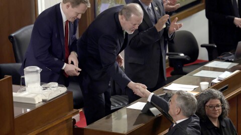 Speaker of the House Destin Hall, R-Caldwell, top left, and Senate leader Phil Berger, R-Rockingham, top center, greet North Carolina Gov. Josh Stein, bottom right, as he arrives to deliver the State of the State address at the Legislative Building, Wednesday, March 12, 2025, in Raleigh N.C.