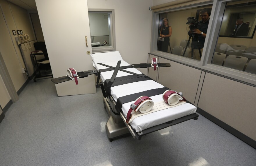 This Thursday, Oct. 9, 2014 photo shows the gurney in the the execution chamber at the Oklahoma State Penitentiary in McAlester, Okla.