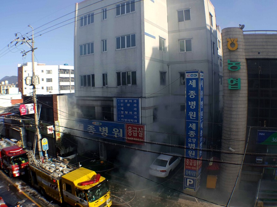 Rescue workers searched a scorched, smoke-filled hospital on Friday in Miryang, South Korea, after a deadly fire broke out in the emergency room.