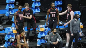 Hartford players watch the final moments of their loss to Baylor during a college basketball game in the first round of the NCAA tournament at Lucas Oil Stadium in Indianapolis Friday, March 19, 2021, in Indianapolis, Tenn. 