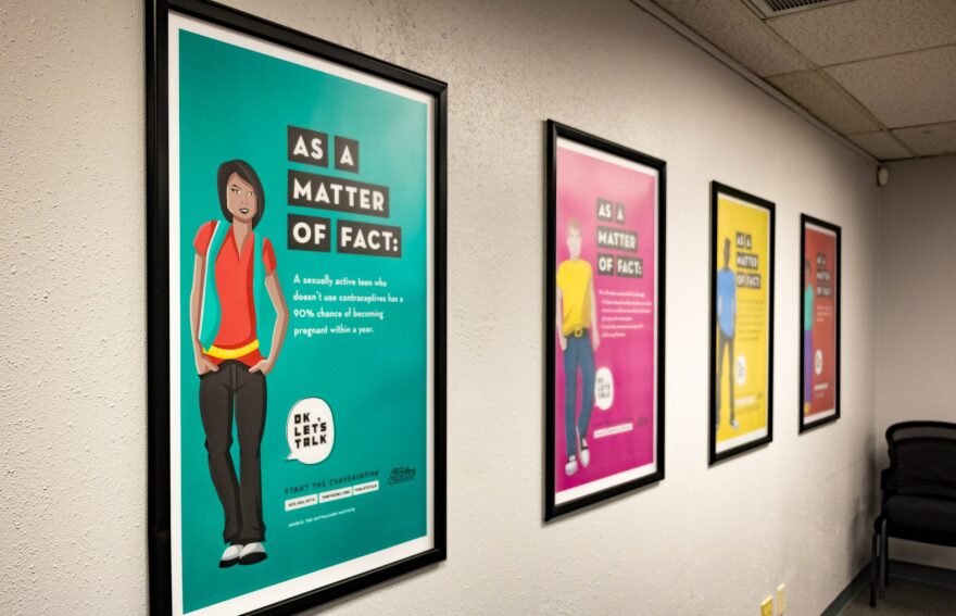 Posters on sexual health at Thrive's headquarters in Oklahoma City.