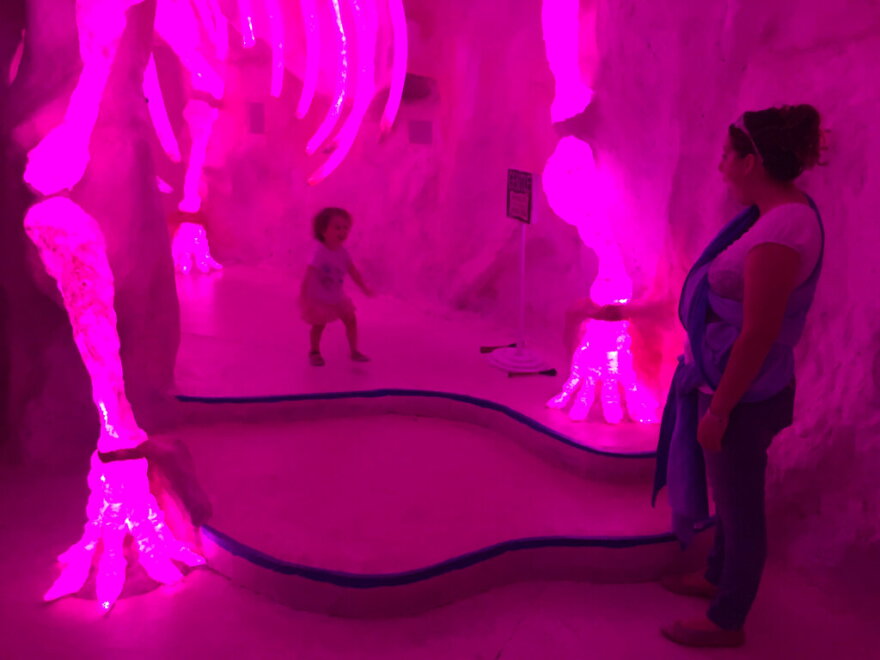 FILE - Visitors explore Meow Wolf's mazelike exhibition space in Santa Fe, N.M., on Friday, July 14, 2017. Matt King, a co-founder of the Santa Fe-based arts collective Meow Wolf that has grown into an offbeat, interactive entertainment juggernaut, died Saturday, July 9, 2022. He was 37. (AP Photo/Morgan Le, File)