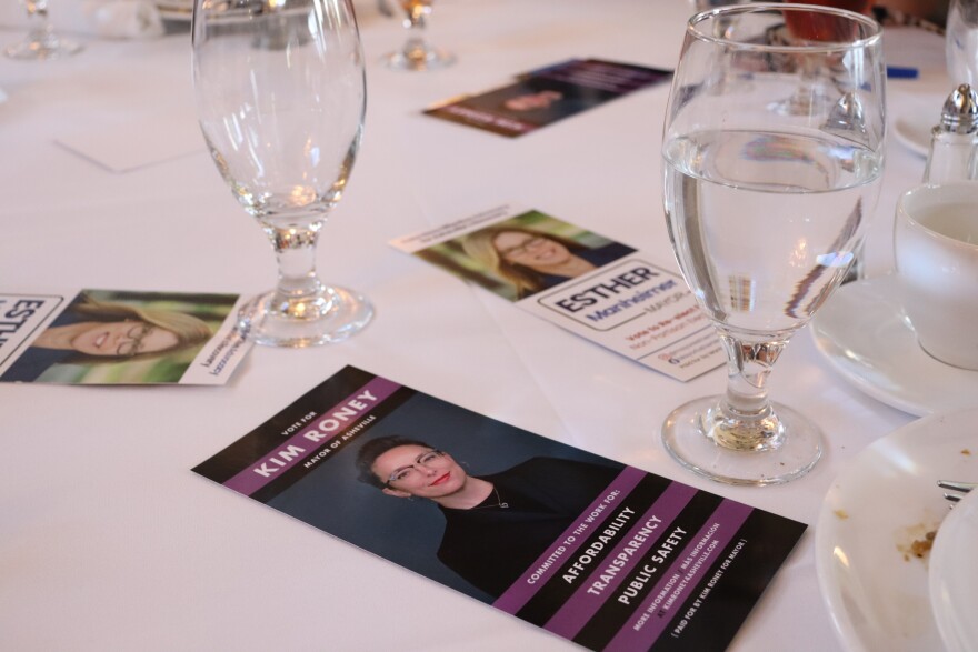Campaign materials at the Leadership Asheville Forum on May 28, 2026.