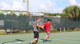 Mark Cavalleri takes the children to his neighborhood clubhouse basketball court on some Saturdays.Photo: Keri Cercy