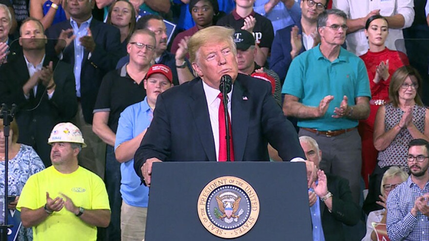 President Donald Trump speaks to the crowd in Evansville where he endorsed Republican Senate candidate Mike Braun.