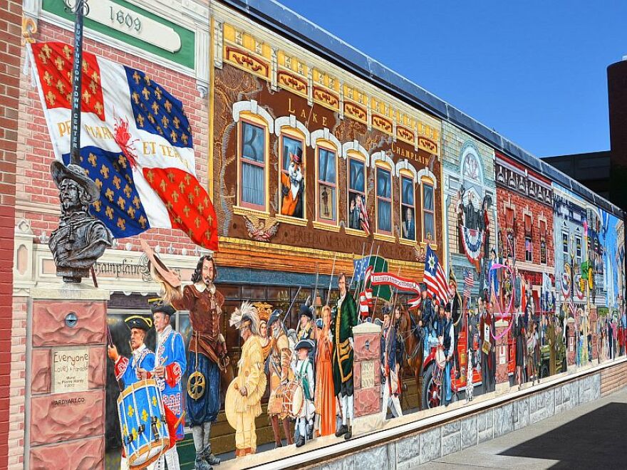 The mural in Burlington reflects 400 years of Vermont history but has drawn criticism for lacking diversity.