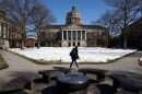 A student on the Eastman Quad of the University of Rochester.