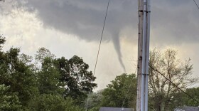 Funnel cloud moving through southern Monroe County Friday night.