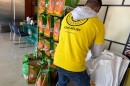 A worker prepares food packages for distribution to clients visiting ICNA Relief's food pantry in St. Louis.