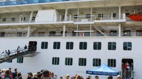 Passengers disembark from a cruise ship in downtown Ketchikan in June 2024. 