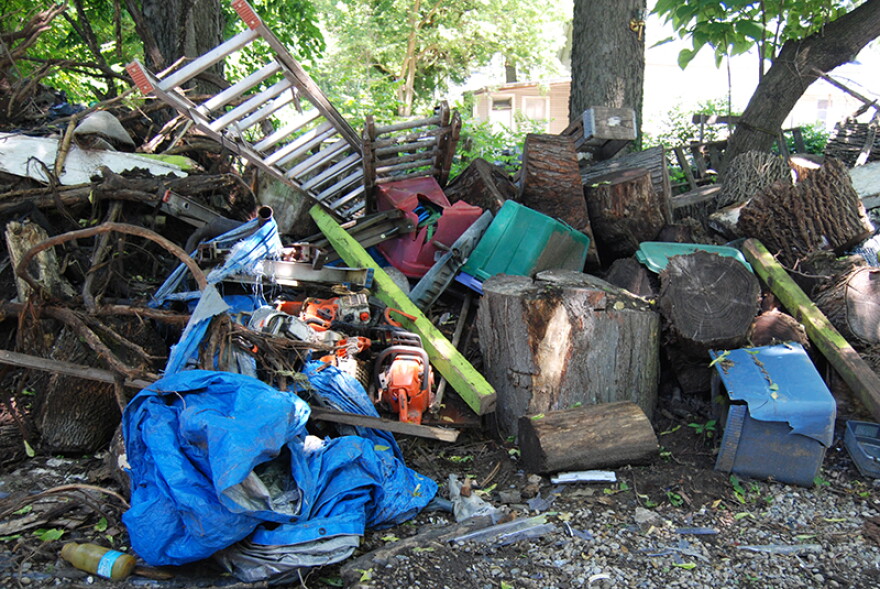 Deputy Kotlas says she takes plenty of photos when investigating an illegal dumpsite, like this one on Borden Street.