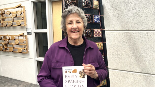 Dr. Judy Bense with her latest book, "Early Spanish Florida."