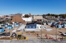 An aerial view of a homeless shelter village under construction.