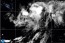 This NOAA satellite image taken at 11:04 a.m. EST on Thursday, Aug. 13, 2026, shows Tropical Storm Lala in the Pacific Ocean. (NOAA via AP)