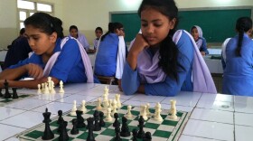 Girls study and compete in chess, just one of several extracurricular activities added to this girls’ public school since the Zindagi Trust adopted it in 2007. (Laura Isensee/Houston Public Media)
