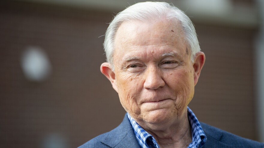 Jeff Sessions talks with the media after voting in Alabama's primary election in Mobile, Ala., on March 3. He faces Tommy Tuberville in Tuesday's Republican Senate runoff.