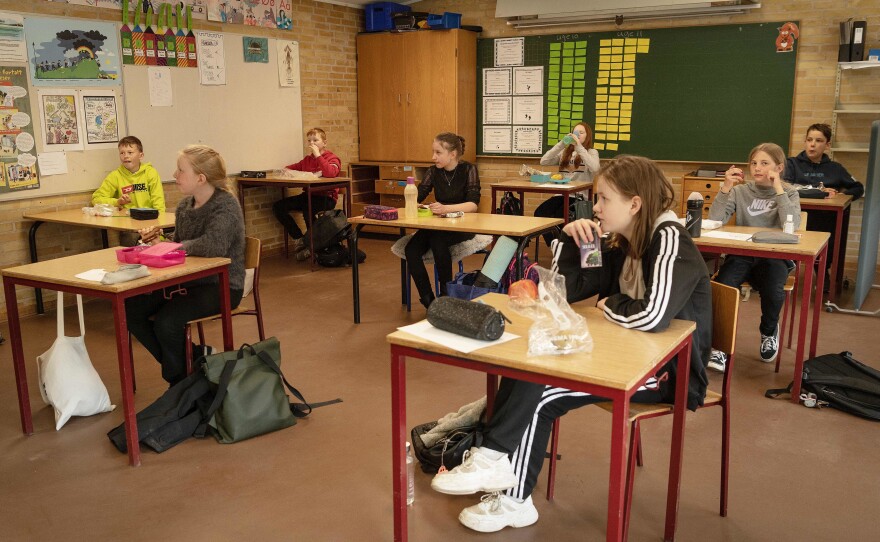 Schoolchildren have lunch at the Korshoejskolen Public school in Randers, Denmark. Denmark began reopening schools on April 15.