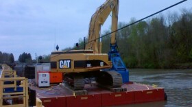 Dredging equipment positioned along the Hudson River at Ft. Edward.