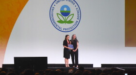Naomi Park, a junior at Greenwich High School, appears with the EPA's Melissa Anley-Mills, as Park is awarded the agency's annual sustainability award. Park's project proposed a process to remove carbon dioxide from ocean acidification hotspots and contain the oil that's left after oil spills.