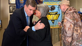 The day before announcing his reelection campaign in March, U.S. Sen. Mark Warner, D-Virginia, meets with Vonda Robinson, president of the National Black Lung Association as well as United Mine Workers of America representatives, healthcare workers, lawyers and miners at the UMWA office in Castlewood, Virginia.
