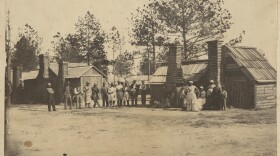 Free men, women and children gathered in 1866 at the Petersburg district headquarters of the Bureau of Refugees, Freedmen, and Abandoned Lands, where they sought assistance with food and clothing rations, education, enforcement of labor contracts and protection from white violence while the Freedmen’s Bureau operated in Virginia between 1865 and 1869.