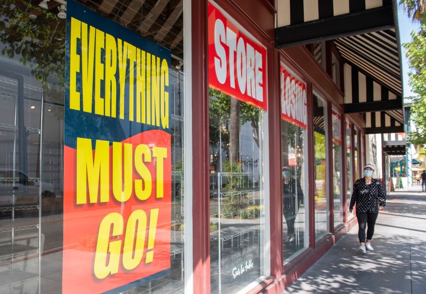 Store closing signs are posted at a Sur La Table kitchenware store on Sept. 22, in Los Angeles. Thousands of retail stores across the country have closed during the pandemic.