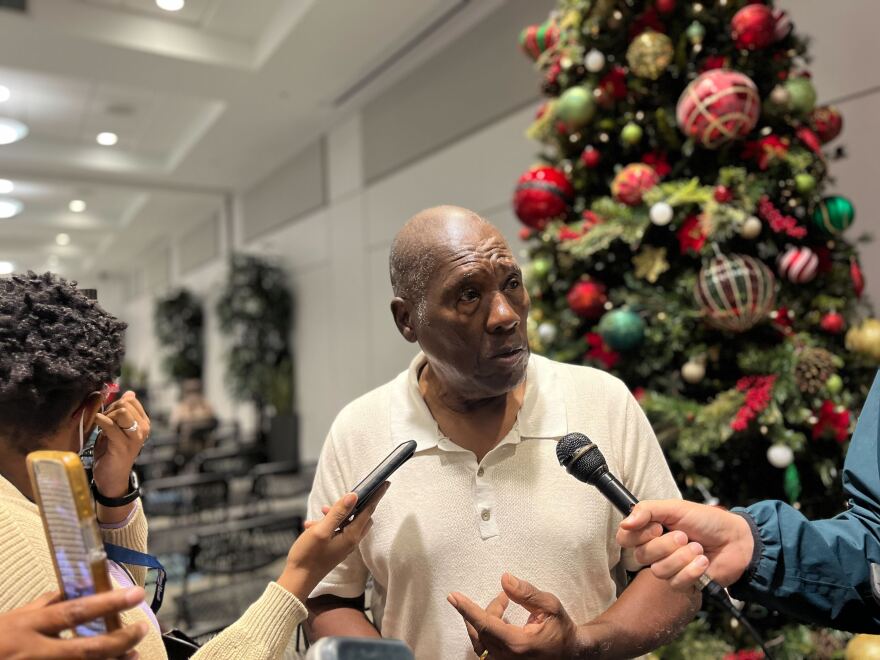 Historian Marvin Dunn speaks to the media after the Miami Dade College Board of Trustees' second vote to bless the transfer of downtown Miami land for a Trump Presidential Library, on Dec. 2, 2025.