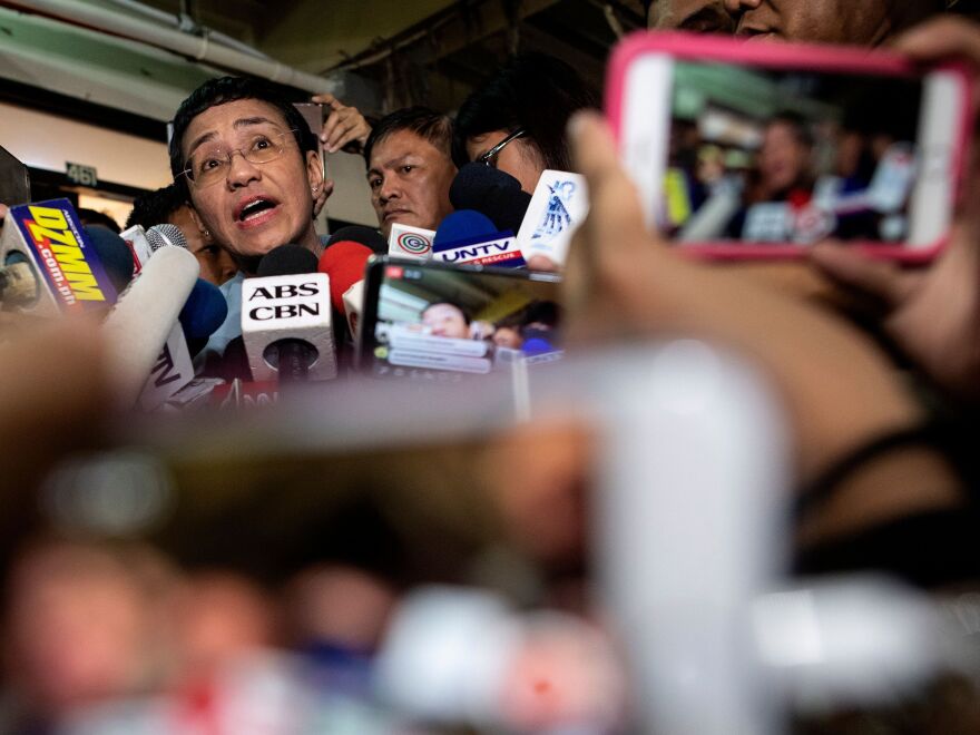 Philippine journalist Maria Ressa gives a statement after posting bail at a regional trial court in Manila on Thursday.