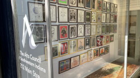 The front window of the Arts Council Gallery on Main St. in Evansville, IN